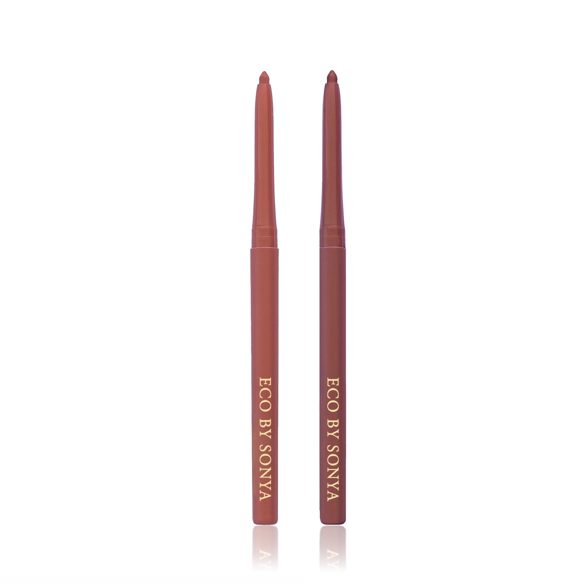 Two Eco By Sonya lip liners in the shades Moody Nude and Perfect Nude,  standing upright on a white background.
