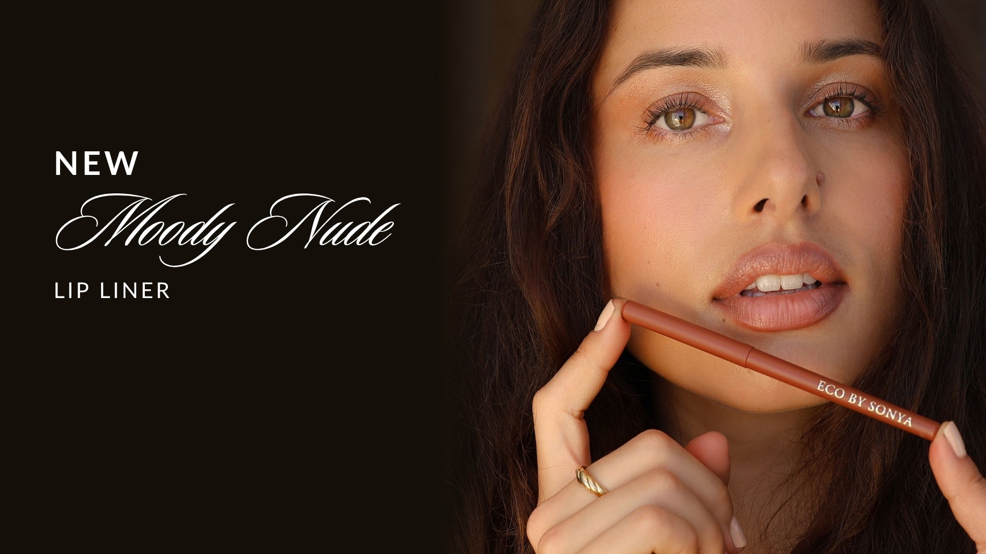 Woman using Eco By Sonya Moody Nude eyeliner