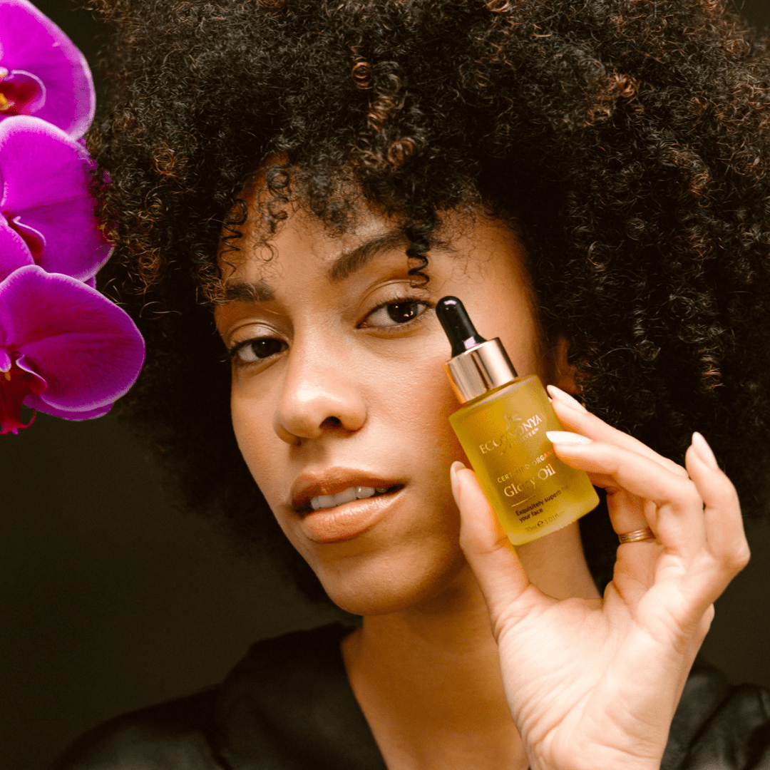 Eco by Sonya Glory Oil with close up face portrait, natural cold pressed seed oil