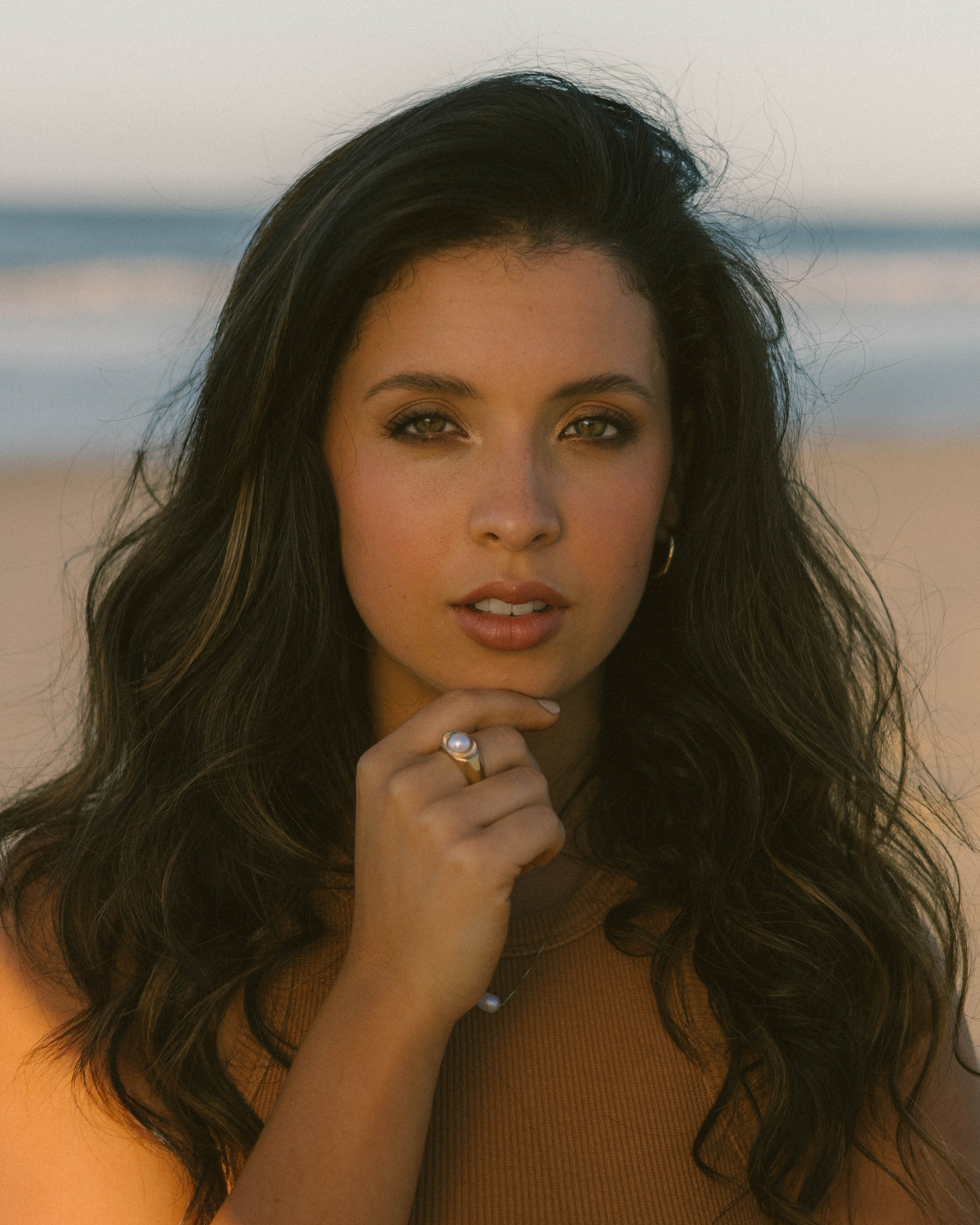 Eco by Sonya natural makeup look eyeshadow blush eyeliner lipstick portrait on beach